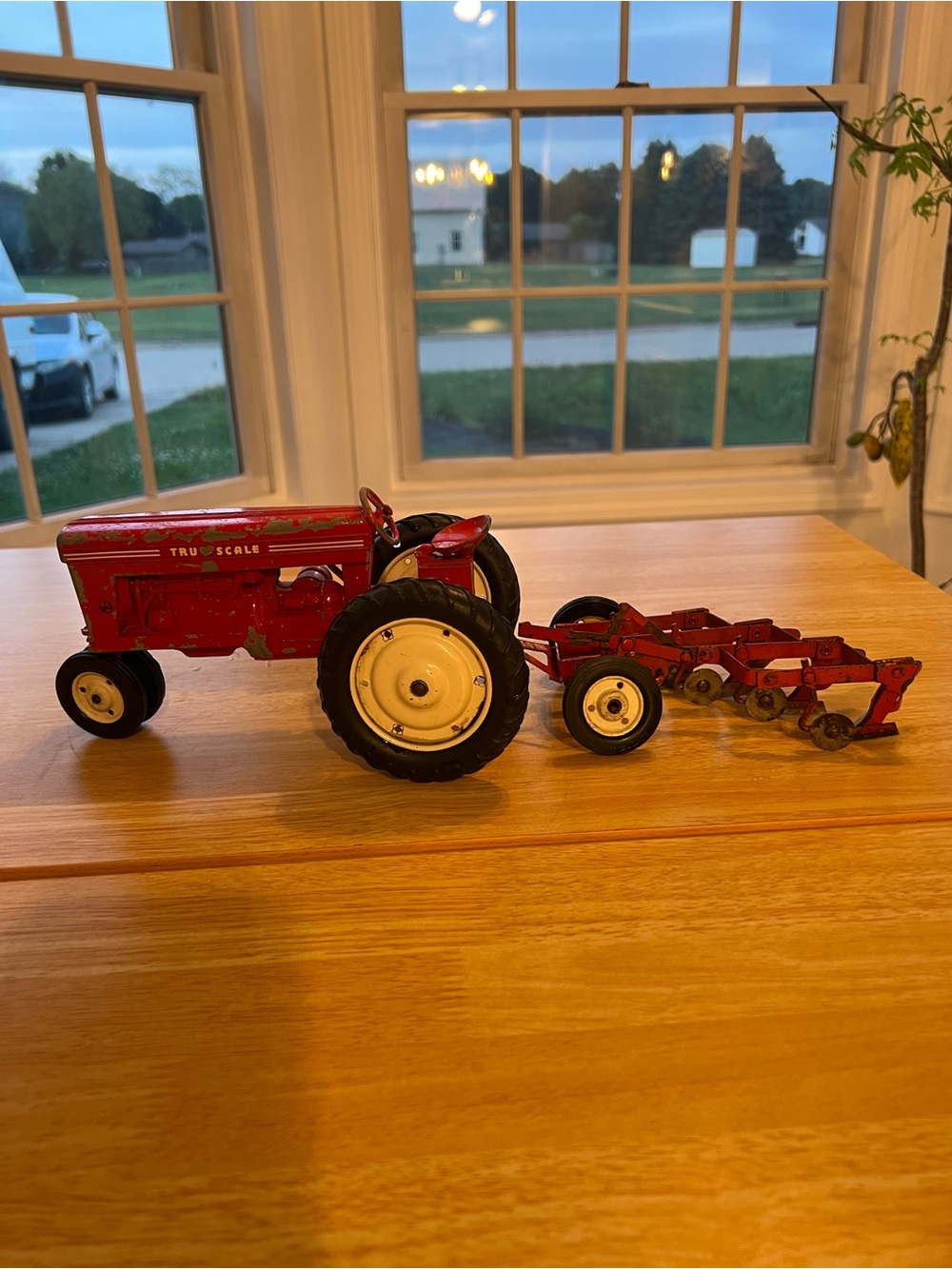 Red Die-Cast Tractor with Plow Attachment - Classic Farm Replica